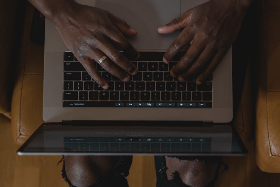 Developer working on a futuristic dashboard interface
